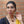Load image into Gallery viewer, woman wearing small elegant gold chain bee necklace