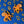 Load image into Gallery viewer, Quirky earrings featuring acrylic blue ringed octopus on gold hoops