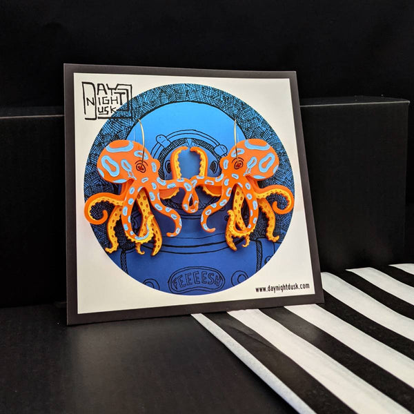 Octopus fun earrings with wiggling tentacles on gold hoops