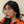 Load image into Gallery viewer, Woman wearing cute pink candy ghost studs