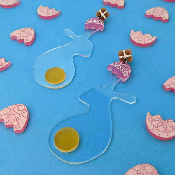 Spring jewellery featuring Easter bunny, Easter egg and hot cross bun