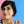 Load image into Gallery viewer, Easter earrings featuring bunnies in a shape of runny egg sliding out of cracked Easter eggs, topped with hot cross buns