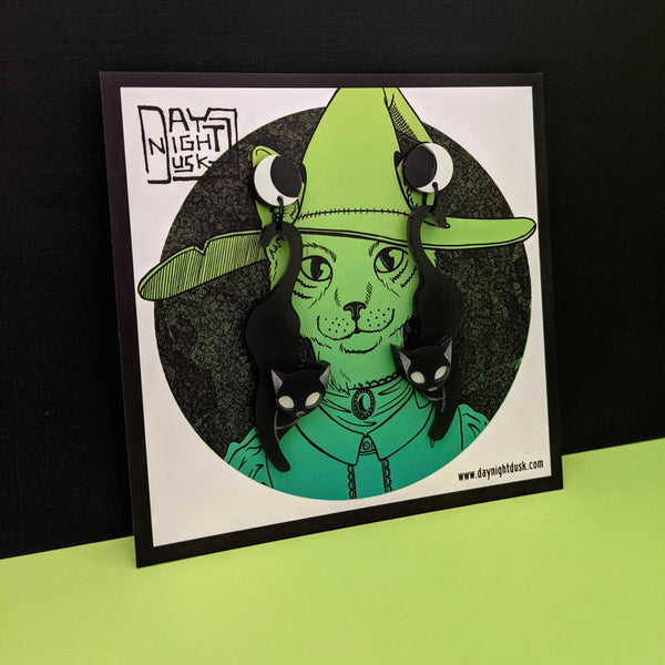 Cat witch wiccan with human familiar and kitty earrings