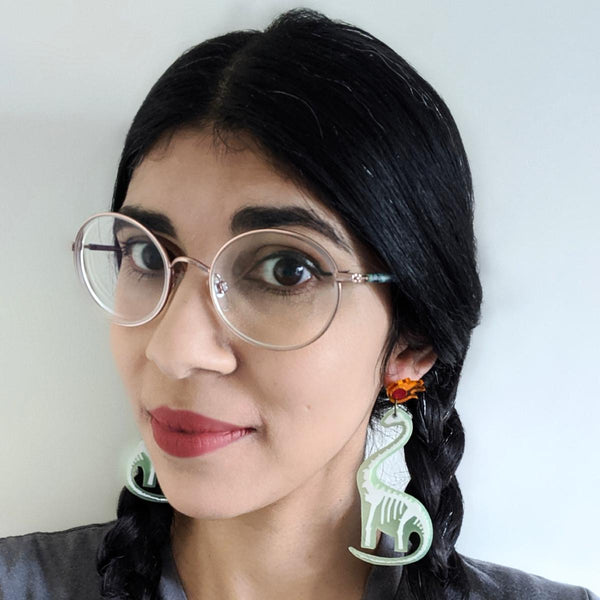 Translucent green plastic dinosaur skeleton earrings a must teacher earrings