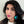 Load image into Gallery viewer, woman wearing royal blue and mirror green peacock acrylic hoop earrings