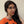 Load image into Gallery viewer, Woman wearing quirky kitten earrings with glowing eyes and moon