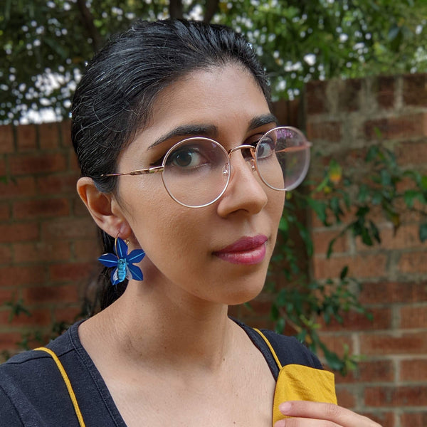 woman wearing statement hoop earrings unique australian made