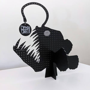 Jewellery stand in a shape of fish made of black laser cut acrylic