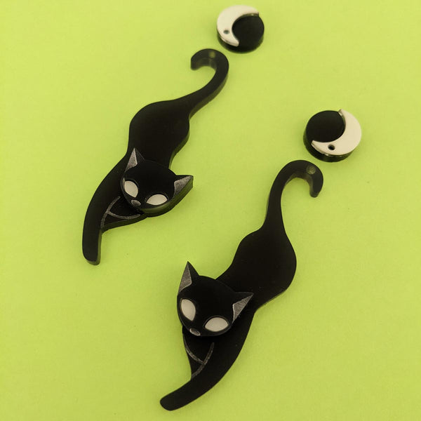 black cat with crescent moon earrings