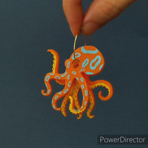 Acrylic blue ringed octopus kinetic earrings on gold hoops
