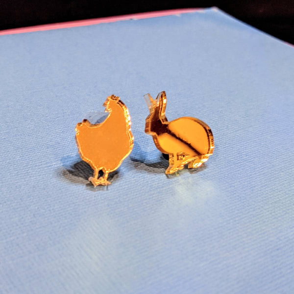Golden Easter pin in a shape of a rabbit and a hen