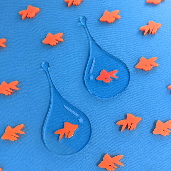 Stylish teardrop earrings made from clear acrylic featuring orange goldfish	